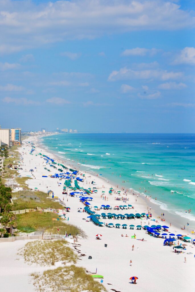 people in Clear blue water in Destin Florida